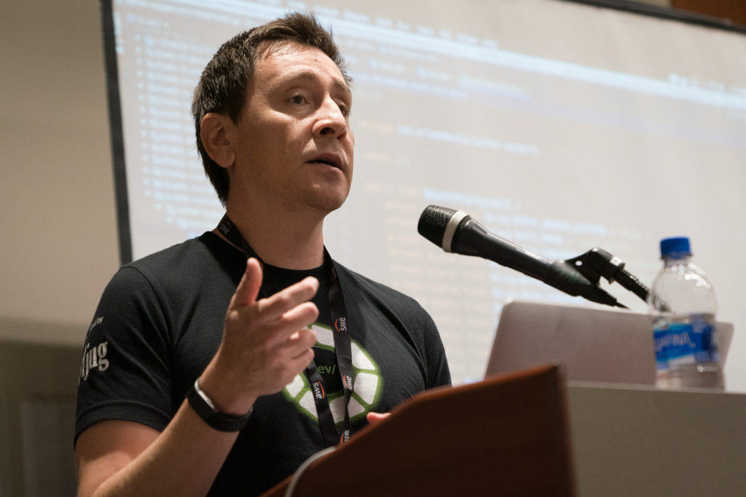 Orlando speaking at a podium